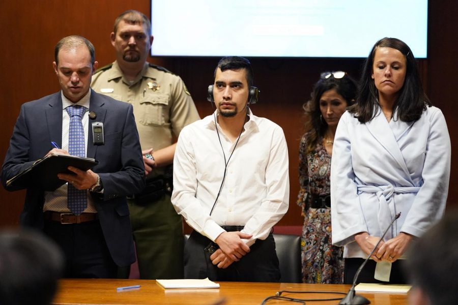 Cristhian Bahena Rivera stands as the verdict in the trial for the death of Mollie Tibbetts is read on May 28, 2021. Bahena Rivera was found guilty of first-degree murder. (Pool Photo/Associated Press)