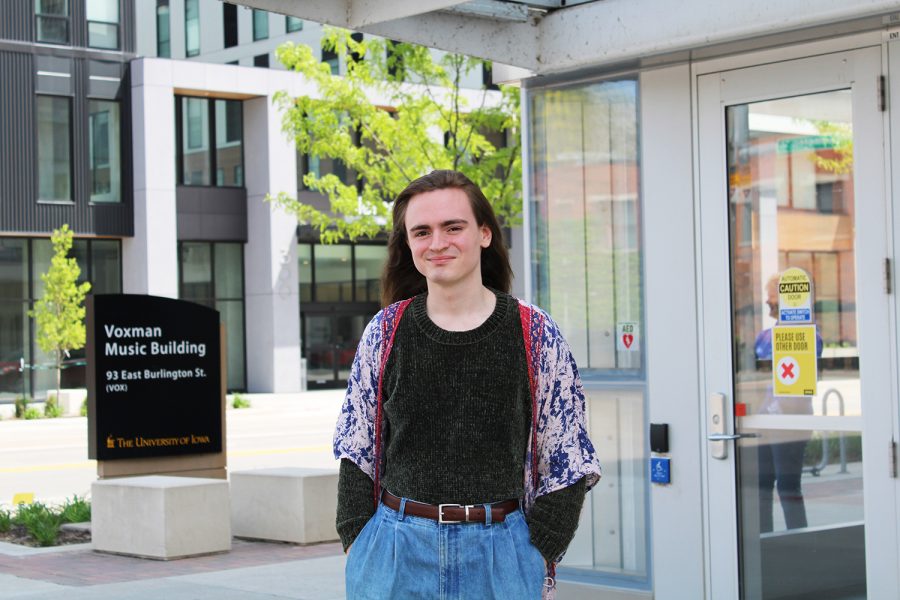 Trinton Prater, a graduate student studying for a masters degree in music composition, is seen outside of the Voxman Music Building on Tuesday, May 4, 2021. 