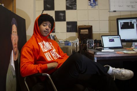 Second-year graduate student in the MFA program in film and video production at the University of Iowa, Trevon Coleman, poses for a portrait in his office at the Becker Communication Studies Building on Wednesday, April 28, 2021. 