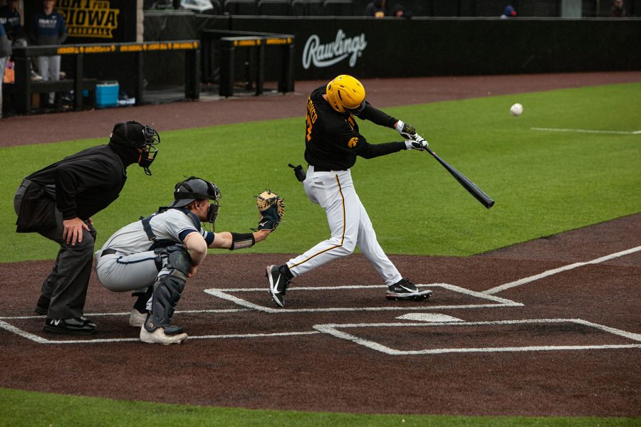 Iowa infielder Dylan Nedved hits the ball during a baseball game between Iowa and Penn State at Duane Banks Baseball Stadium on Saturday, May 8, 2021. The Nittany Lions defeated the Hawkeyes 5-4.