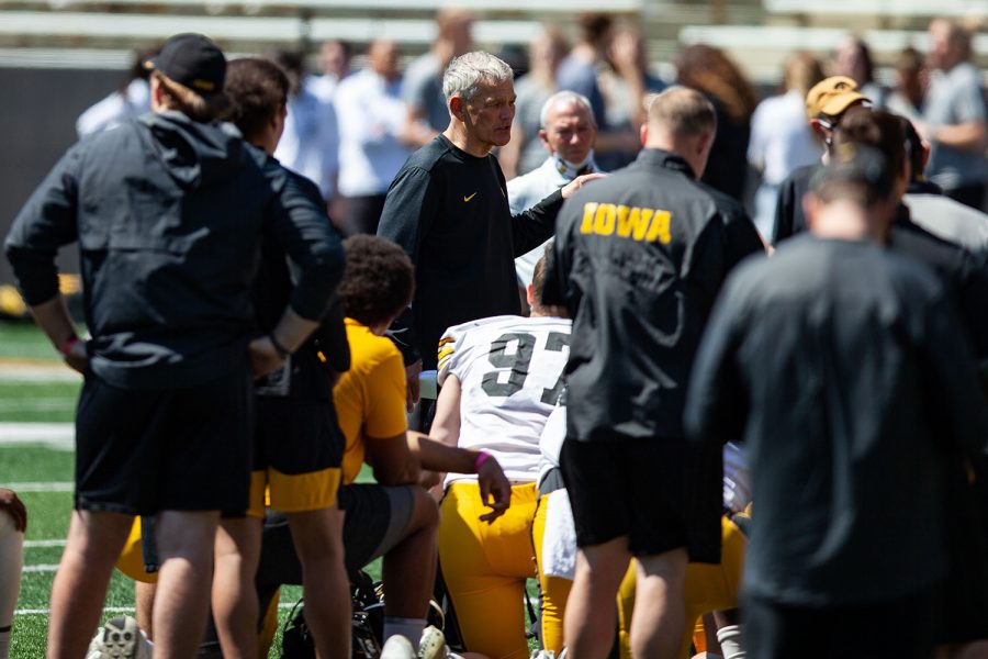 Iowa head coach Kirk Ferentz talks to players after a spring practice at Kinnick Stadium on Saturday, May 1, 2021.
