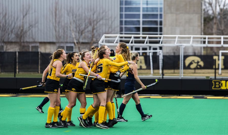 Hawkeyes+celebrate+their+first+point+during+a+field+hockey+game+between+Iowa+and+Michigan+at+Grant+Field+on+Saturday%2C+March+15%2C+2021.+The+Hawkeyes+defeated+the+Wolverines%2C+2-1%2C+in+a+shootout.