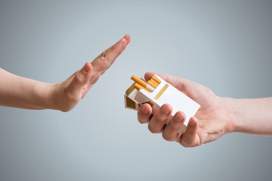 Quitting,Smoking,Concept.,Hand,Is,Refusing,Cigarette,Offer.