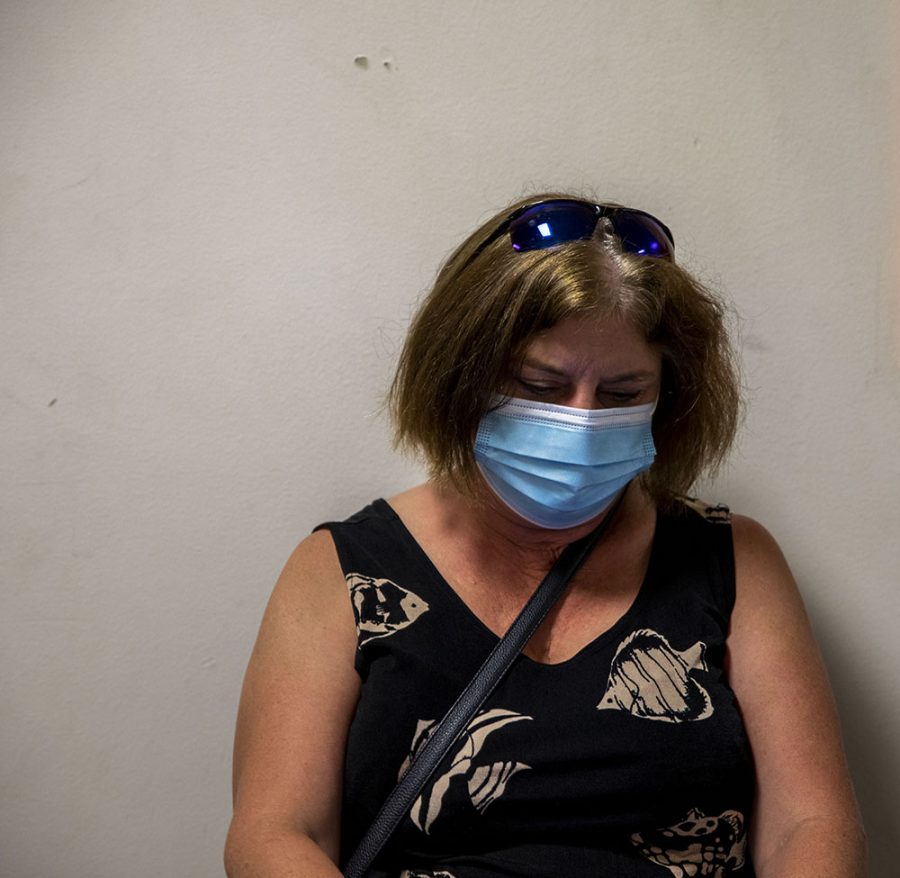 Tammy Wright of Swisher fills out paperwork before giving blood. Wright says that “I got a call and that I was a match, and a young man needs blood”.Friday, June, 25, 2021. 