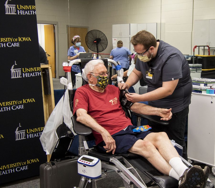 Ken Royar of Iowa City waits while Neil LeFebure BSN starts preparations for Royar to donate blood. A blood drive was held for Tyler Juhl who is battling cancer. The drive was held by University of Iowa DeGowin Blood Center. while Friday, June, 25, 2021. 