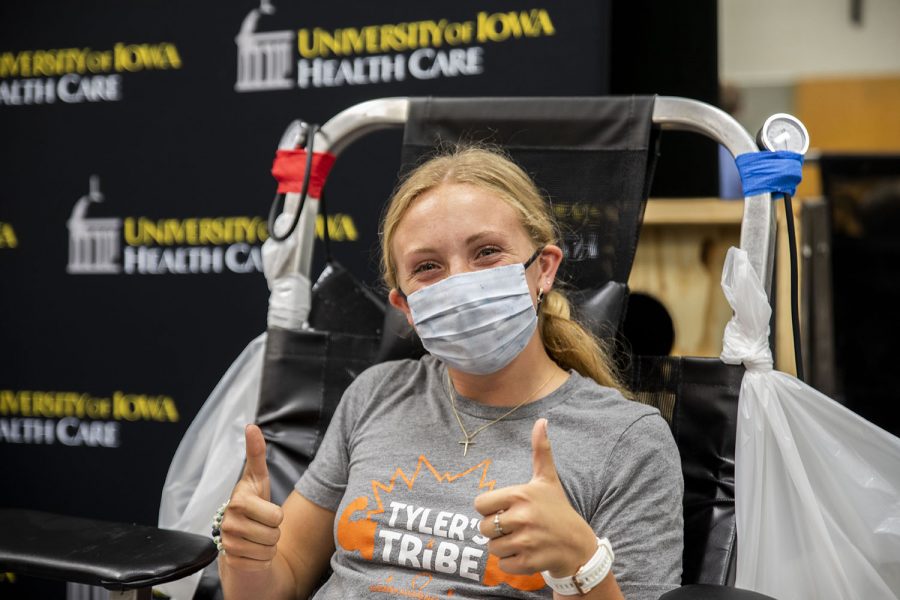 Kiersten Conway gives a two thumbs up as she is getting ready to donate blood on Friday, June, 25, 2021. Conway is the big sister of Tyler Juhl who the drive is being held for.