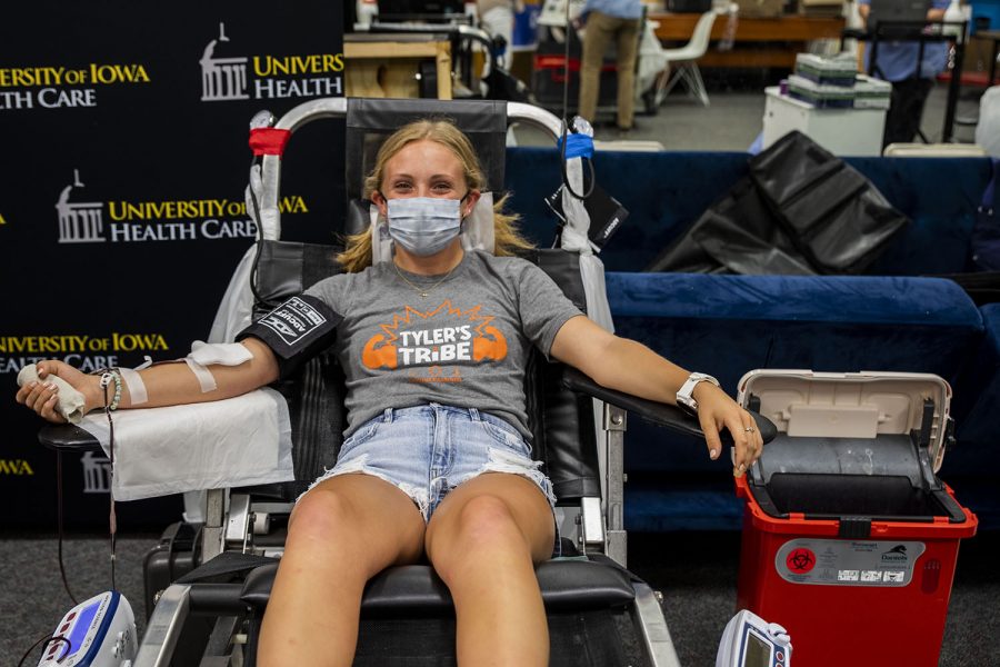 Kiersten Conway relaxes while donating blood on Friday, June, 25, 2021. Conway was at the drive to help and donate blood for her little brother Tyler Juhl who is battling cancer. 