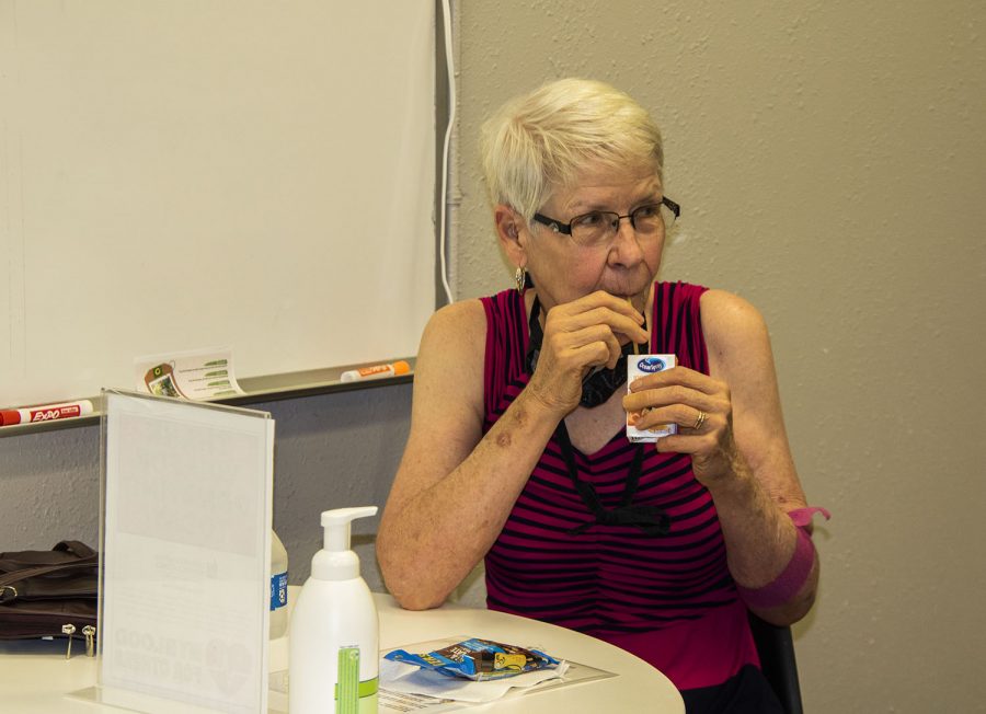 Gayle Royer of Iowa City enjoys a snack after donating blood. A blood drive was held at the Solon Community Center. The drive was held for Tyler Juhl who is battling cancer.