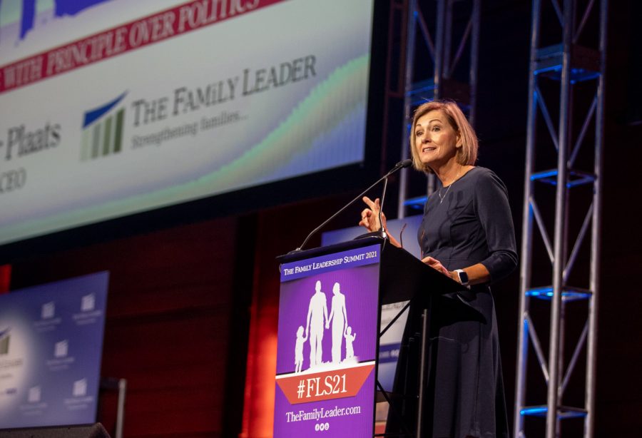 Iowa Gov. Kim Reynolds delivers a speech during The Family Leadership Summit in Des Moines, Iowa, on Friday, July 16, 2021.  Members of the crowd cheered when Gov. Reynolds brought up legislation that banned mask mandates in public schools. 
