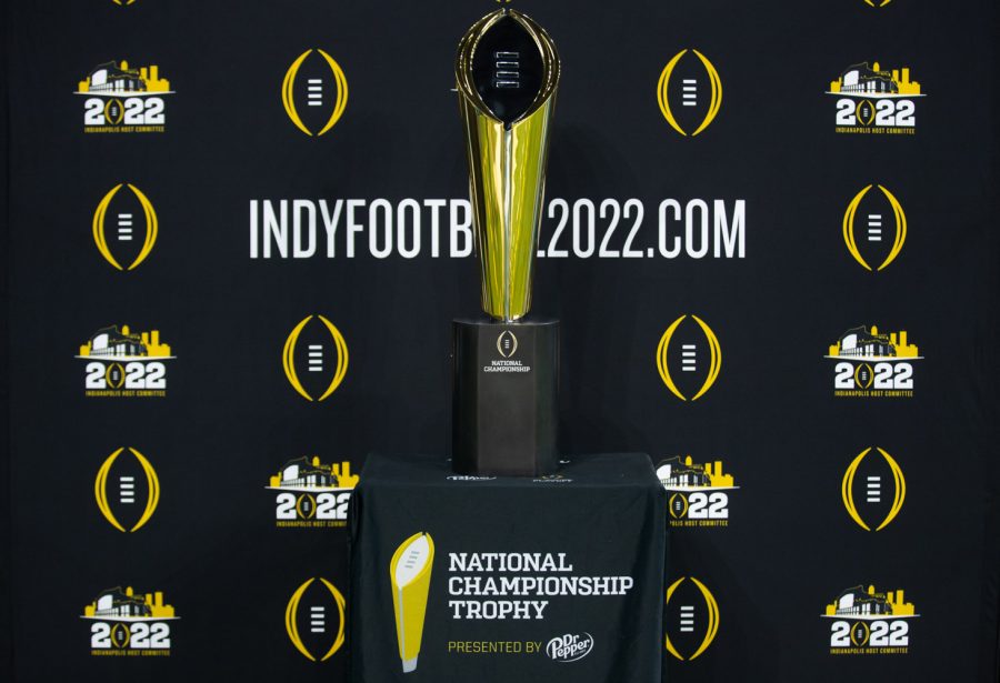 The National Championship Trophy is shown during day one of Big Ten Media Days at Lucas Oil Stadium in Indianapolis, Indiana, on Thursday, July 22. Indianapolis is set to host the College Football Playoffs in 2022. 