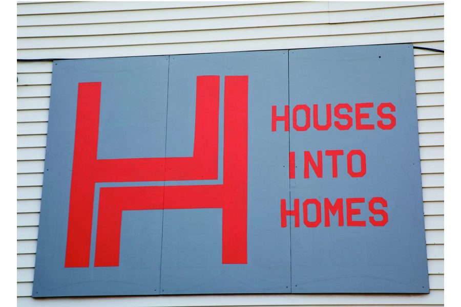 Houses Into Homes Sign as seen on Friday, July 2, 2021. 