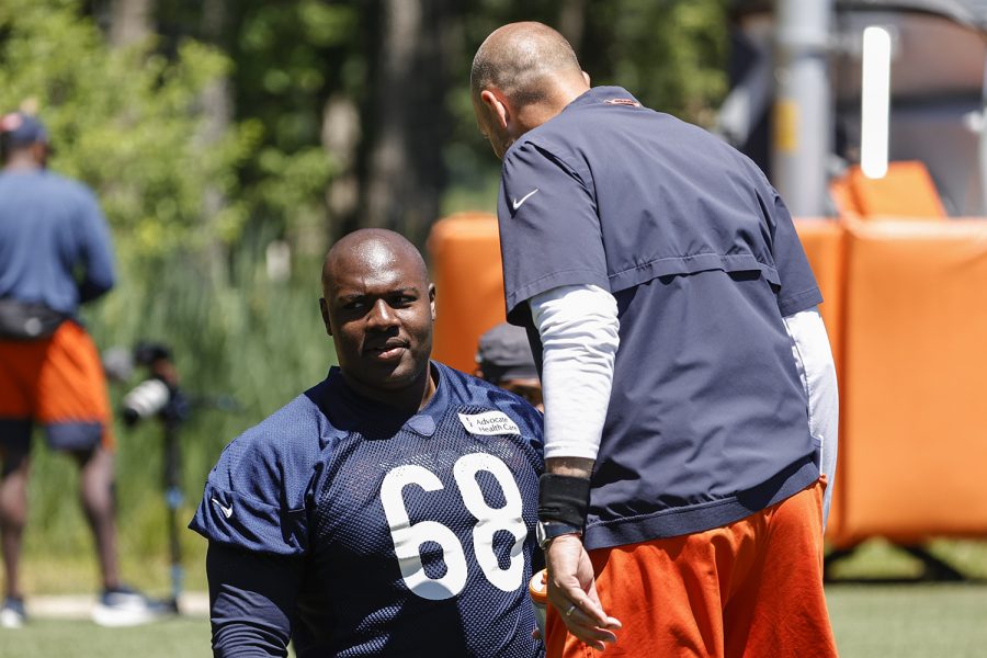 Jun 16, 2021; Lake Forest, Illinois, USA; Chicago Bears head coach Matt Nagy, right, chats with James Daniels (68) during minicamp at Halas Hall.