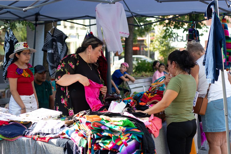 Vendors sell food, clothing, jewelry and other goods at the Latino Festival in Iowa City on Saturday, Aug. 28, 2021. 