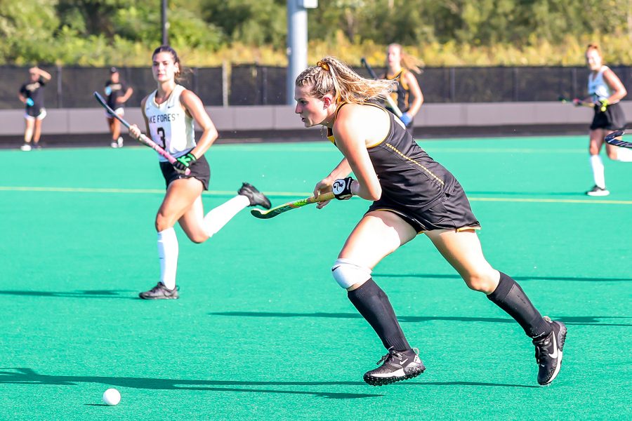 Iowa midfielder/forward Ellie Holley runs after the ball to gain possession during the Iowa Field Hockey Big Ten/ACC Challenge game against Wake Forest on Aug. 27, 2021 at Grant Field. Iowa defeated Wake Forest 5-3. 