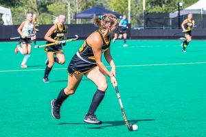 Iowa forward/midfielder Maddy Murphy runs down the field with the ball during the Iowa Field Hockey Big Ten/ACC Challenge game against Wake Forest on Aug. 27, 2021 at Grant Field. Iowa defeated Wake Forest 5-3. 