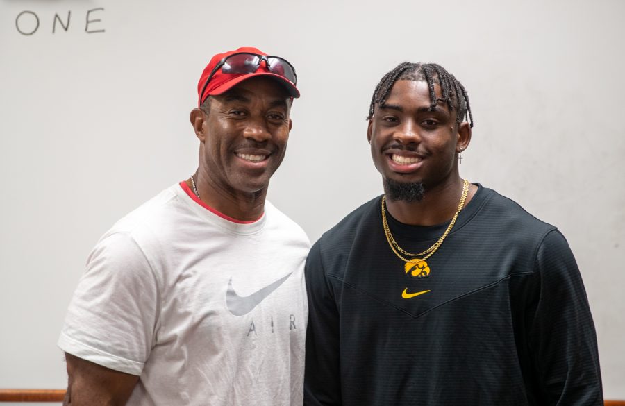 Iowa running back Tyler Goodson poses with Gerald “Boo” Mitchell in Suwanee, Georgia, on Aug. 1, 2021. Mitchell, a former All-American wide receiver for Vanderbilt, is Goodsons former high school coach and current personal trainer.