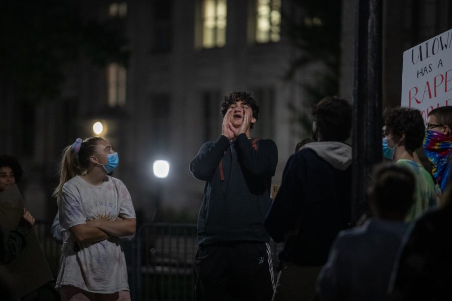 A protest organizer leads chants during the third night of protests following sexual assault allegations against the University of Iowa’s chapter of Phi Gamma Delta at the Pentacrest on Thursday, Sept. 2, 2021. 