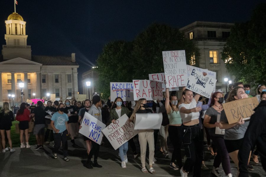 Protesters march away from the Pentacrest toward downtown Iowa City during the third night of protests following sexual assault allegations against the University of Iowa’s chapter of Phi Gamma Delta on Thursday, Sept. 2, 2021. 