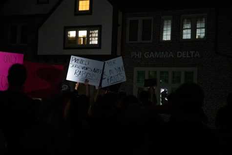 People protest during the third night of protests following sexual assault allegations against the University of Iowa’s chapter of Phi Gamma Delta at the chapter structure on Thursday, Sept. 2, 2021. 