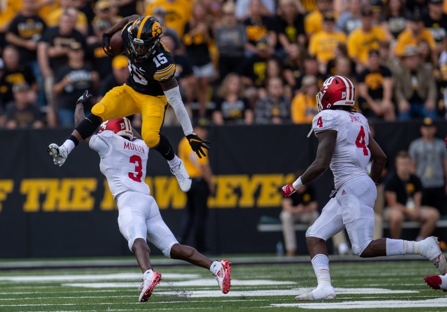 Iowa+running+back+Tyler+Goodson+hurdles+Indiana+defensive+back+Tiawan+Mullen+during+a+football+game+between+No.+18+Iowa+and+No.+17+Indiana+at+Kinnick+Stadium+on+Saturday%2C+Sept.+4%2C+2021.+The+Hawkeyes+defeated+the+Hoosiers+34-6.