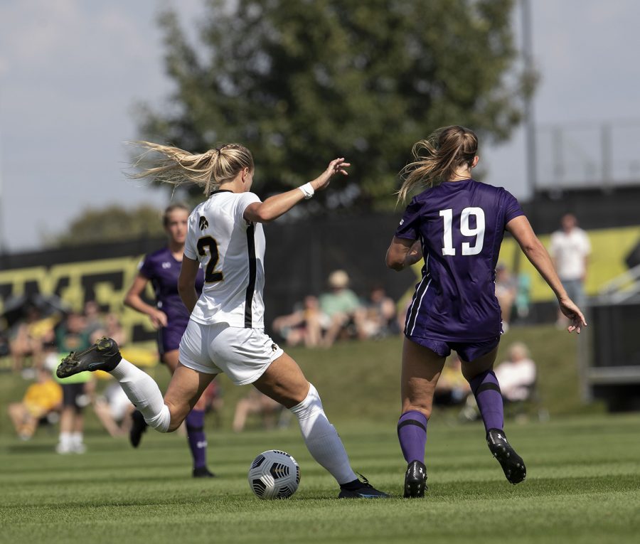 Hawkeye midfielder Hailer Ryderberg kicks the ball towards the middle of the field toward her teammates during a soccer match between Iowa and Northwestern at the University of Iowa Soccer Complex on Sunday, Sept. 19, 2021. The Hawkeyes defeated the Wildcats with a score of 2-1.