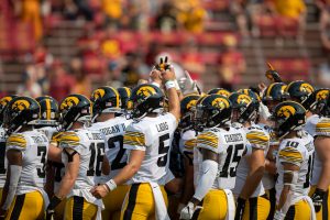 The Iowa Hawkeyes huddle up before a football game between No. 10 Iowa and No. 9 Iowa State at Jack Trice Stadium in Ames on Saturday, Sept. 11, 2021. (Jerod Ringwald/The Daily Iowan)
