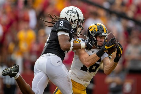 Iowa wide receiver Charlie Jones catches a ball for a touchdown during a football game between No. 10 Iowa and No. 9 Iowa State at Jack Trice Stadium in Ames on Saturday, Sept. 11, 2021. The Hawkeyes defeated the Cyclones 27-17. 