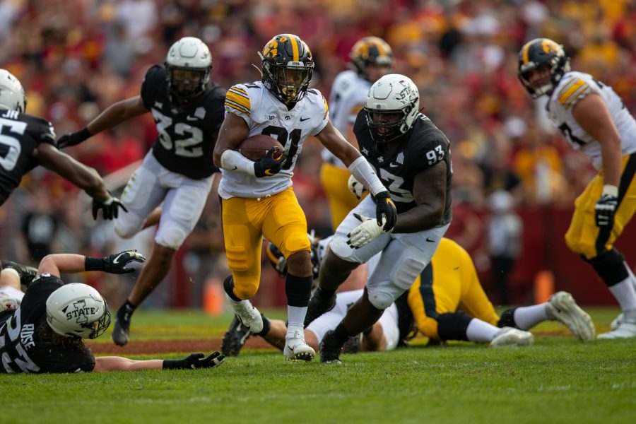 Iowa running back Ivory Kelly-Martin breaks free during a football game between No. 10 Iowa and No. 9 Iowa State at Jack Trice Stadium in Ames on Saturday, Sept. 11, 2021. The Hawkeyes defeated the Cyclones 27-17. 