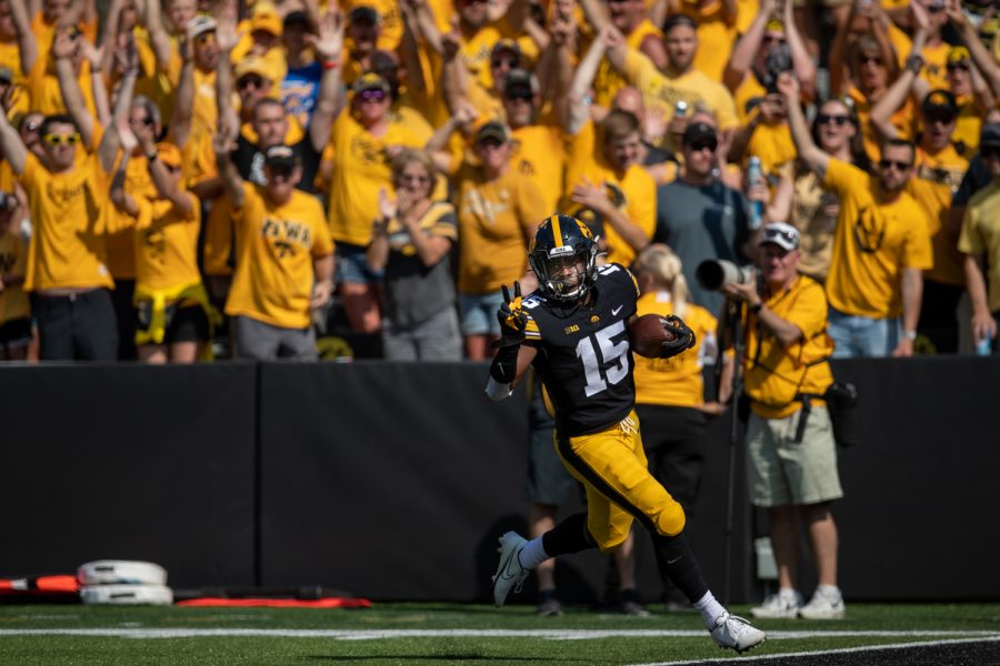 Iowa running back Tyler Goodson puts up the peace sign while running into the end zone for a touchdown during a football game between Iowa and Kent State at Kinnick Stadium on Saturday, Sept. 18, 2021. (Jerod Ringwald/The Daily Iowan)