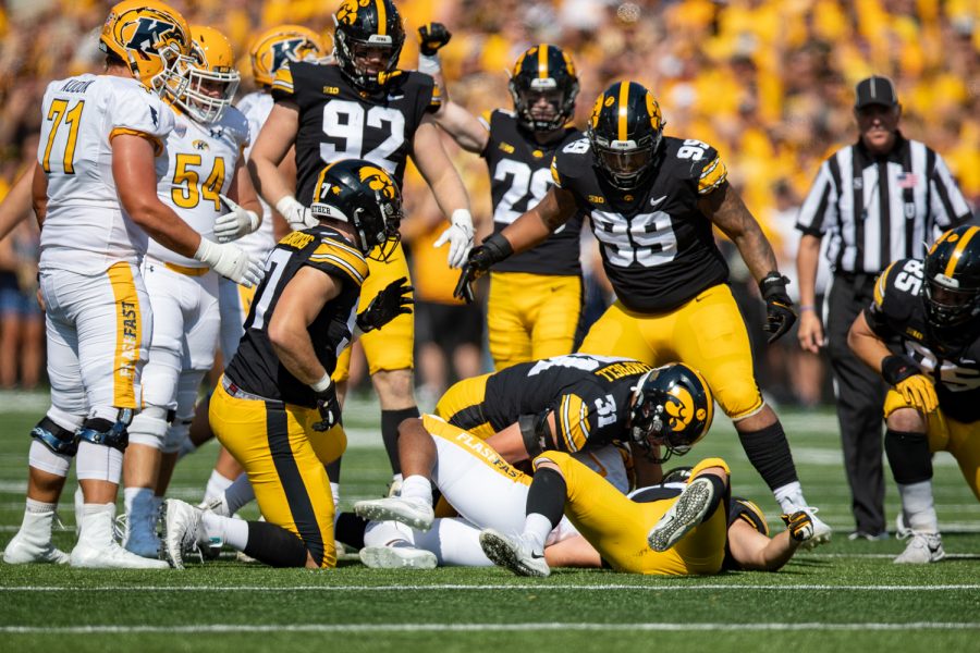 Iowa+linebacker+Jack+Campbell+tackles+Kent+State+running+back+Marquez+Cooper+during+a+football+game+between+Iowa+and+Kent+State+at+Kinnick+Stadium+on+Saturday%2C+Sept.+18%2C+2021.+The+Hawkeyes+defeated+the+Golden+Flashes+30-7.+%28Jerod+Ringwald%2FThe+Daily+Iowan%29