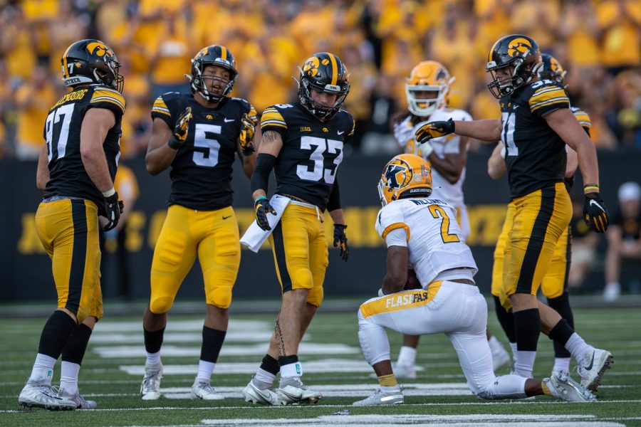 Iowa defensive back Riley Moss looks down at Kent State running back Xavier Williams during a football game between Iowa and Kent State at Kinnick Stadium on Saturday, Sept. 18, 2021. The Hawkeyes defeated the Golden Flashes 30-7. (Jerod Ringwald/The Daily Iowan)