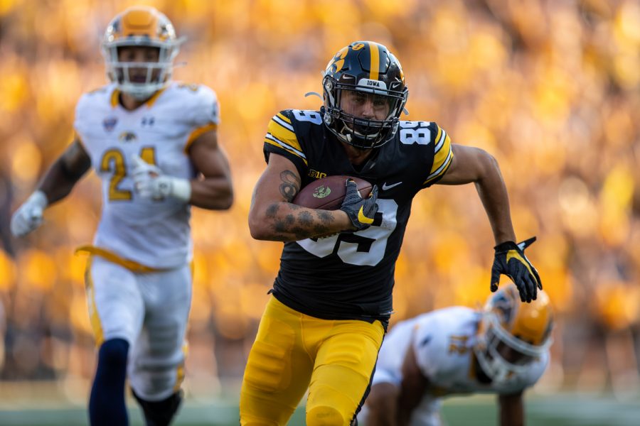 Iowa wide receiver Nico Ragaini runs after completing a catch during a football game between Iowa and Kent State at Kinnick Stadium on Saturday, Sept. 18, 2021. The Hawkeyes defeated the Golden Flashes 30-7. (Jerod Ringwald/The Daily Iowan)