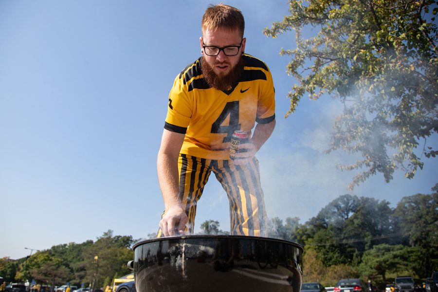 Josh Shaw grills in Iowa City before a football game between No. 5 Iowa and Kent State on Saturday, Sept. 18, 2021. 