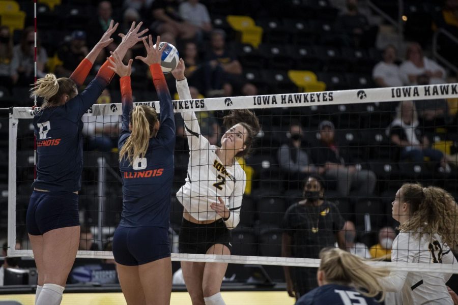 Iowa right side Courtney Buzzerio spikes the ball during a volleyball game between Iowa and Illinois at Xtreme Arena in Coralville, Iowa, on Wednesday, Sept. 22, 2021. The Fighting Illini defeated the Hawkeyes with a score of 3-2. 