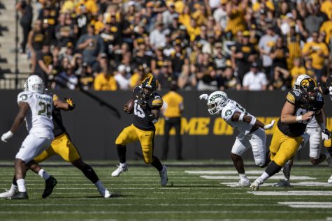 Iowa running back Tyler Goodson finds a gap during a football game between Iowa and Colorado State at Kinnick Stadium on Saturday, Sept. 25, 2021. 