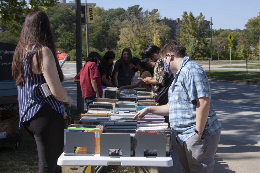 The Association of Graduate Students in English are holding a book sale outside of the University of Iowa English Philosophy Building on Monday, Sept. 27, 2021. “Our goal is to raise money for AGSE and we’ll be here all week from 9 p.m. to 4:30 p.m. for cash only sales,” said Jamie Chen.