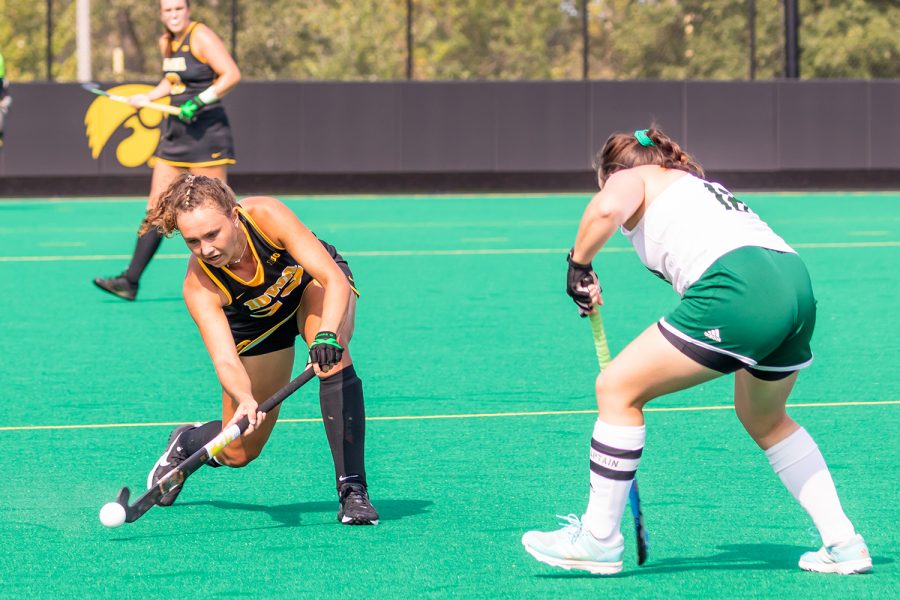 Iowa defender Harper Dunne goes to pass the ball down the field during the Iowa Field Hockey game against Ohio University on Sep. 10, 2021 at Grant Field. Iowa defeated Ohio 8-0. (Casey Stone/The Daily Iowan)
