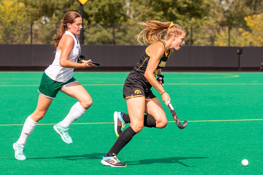 Iowa midfielder/forward Sofie Stribos runs to keep possession of the ball during the Iowa Field Hockey game against Ohio University on Sep. 10, 2021 at Grant Field. Iowa defeated Ohio 8-0. (Casey Stone/The Daily Iowan)
