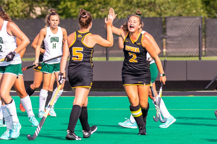 Iowa forward Emily Deuell and midfielder/forward Meghan Conroy celebrate a goal during the Iowa Field Hockey game against Ohio University on Sep. 10, 2021 at Grant Field. Iowa defeated Ohio 8-0. (Casey Stone/The Daily Iowan)