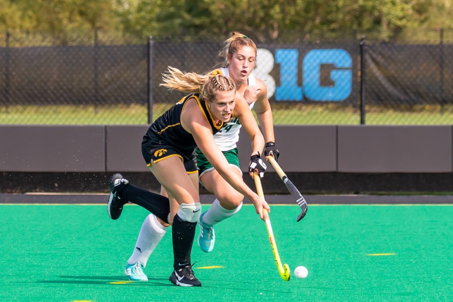 Iowa midfielder/forward Ellie Holley runs the ball down the field during the Iowa Field Hockey game against Ohio University on Sep. 10, 2021 at Grant Field. Iowa defeated Ohio 8-0. (Casey Stone/The Daily Iowan)