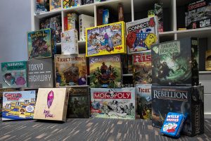 A shelf of board games is shown from the inside of the board cafe, Fortuna in Iowa City on Sept. 29, 2021. 