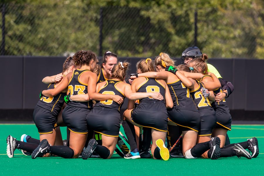 The Iowa Hawkeyes huddle together before the Iowa Field Hockey game against Ohio University on Sep. 10, 2021 at Grant Field. Iowa defeated Ohio 8-0. (Casey Stone/The Daily Iowan)