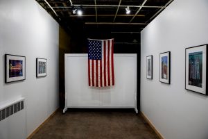 A flag hangs at the entrance to The Flag Project exhibit at the Artifactory in Iowa City on Monday, Sept. 13, 2021.