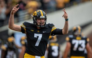 Iowa quarterback Spencer Petras celebrates a touchdown from running back Tyler Goodson during a football game between No. 18 Iowa and No. 17 Indiana at Kinnick Stadium on Saturday, Sept. 4, 2021. 