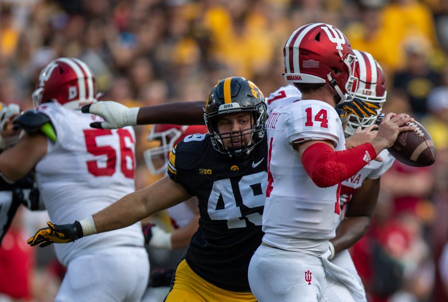 Iowa defensive lineman Ethan Hurkett disrupts Indiana quarterback Jack Tuttle during a football game between No. 18 Iowa and No. 17 Indiana at Kinnick Stadium on Saturday, Sept. 4, 2021. The Hawkeyes defeated the Hoosiers 34-6. 