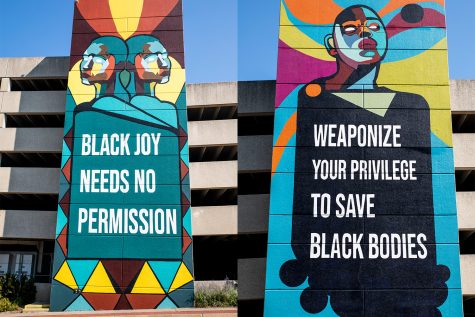 A mural is seen on Burlington Street on Monday, Aug. 30, 2021. Oracles of Iowa City is a mural project in collaboration with Public Space One and the Center for Afrofuturist Studies.