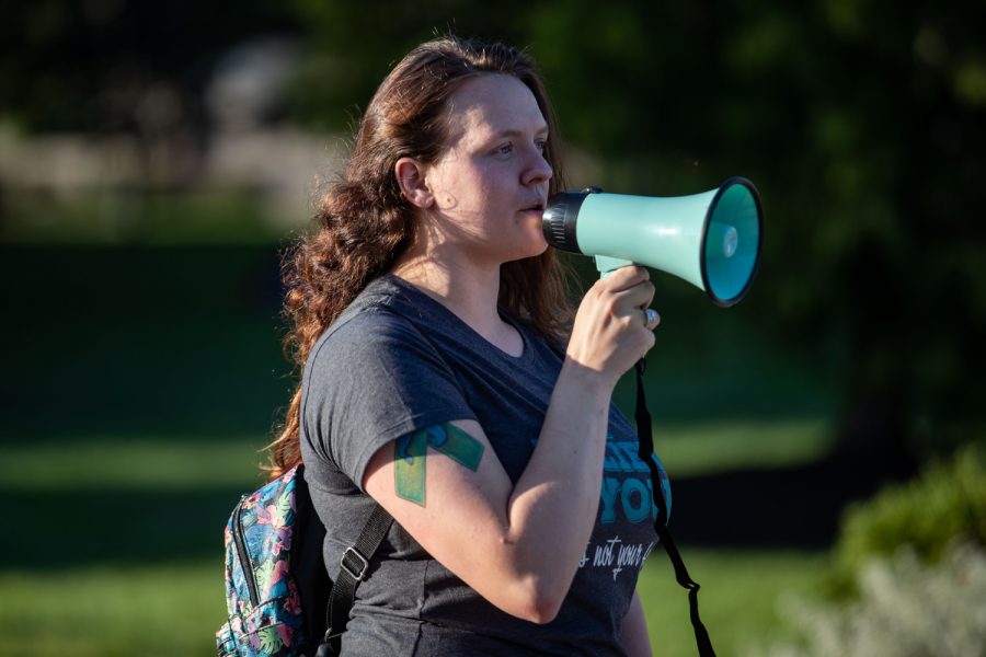 U for Us member Rebecca Evans speaks during the March for Survivors demonstration on the Pentacrest on Thursday, Sept. 16, 2021. Their goal is to support survivors of sexual assault, and they plan to meet every Thursday at 5 p.m on the Pentacrest. 