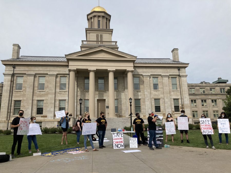 Members of COGS protest the lack of mask mandates on campus at the Pentacrest on Thursday, Sept. 2, 2021. 
