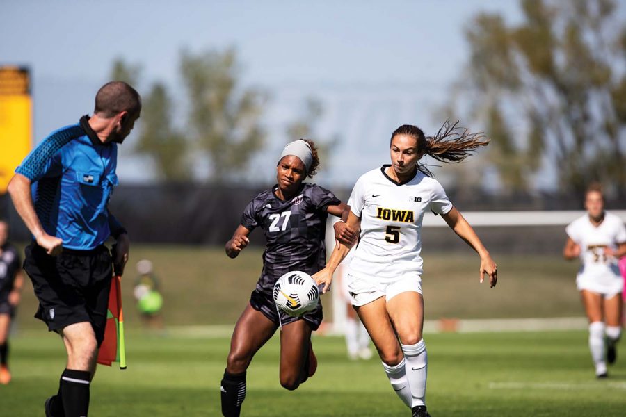 University of Iowa Defender Riley Whitaker and Mississippi State Forward Hailey Farrington-Bentil both chase the ball up the sideline at UI Soccer Complex on Sunday, Sept. 5, 2021. The Iowa Hawkeyes and Mississippi State Bulldogs tied 1-1. 