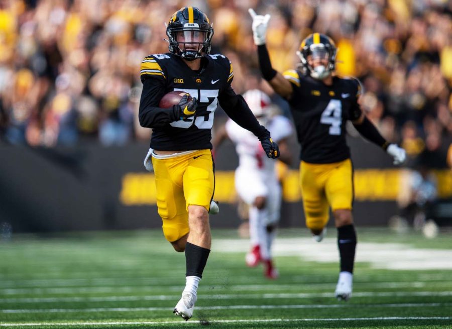 Iowa defensive back Riley Moss returns an interception for his second pick six of the day during a football game between No. 18 Iowa and No. 17 Indiana at Kinnick Stadium on Saturday, Sept. 4, 2021. 